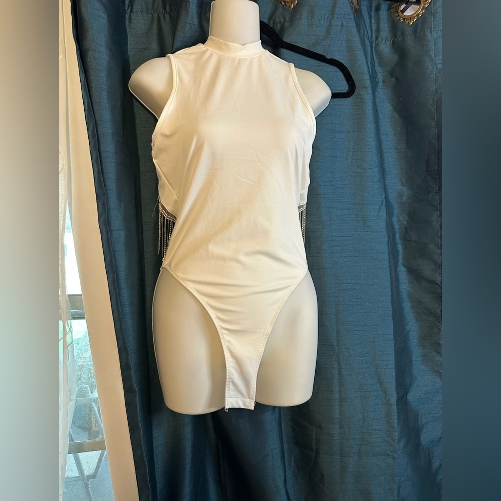 Elegant White Sleeveless Bodysuit with open back with Dangling Rhinestones.